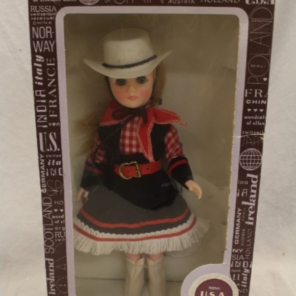 two vintage "the wonderful world of effanbee" dolls. one is still secured in the - Picture 2 of 4